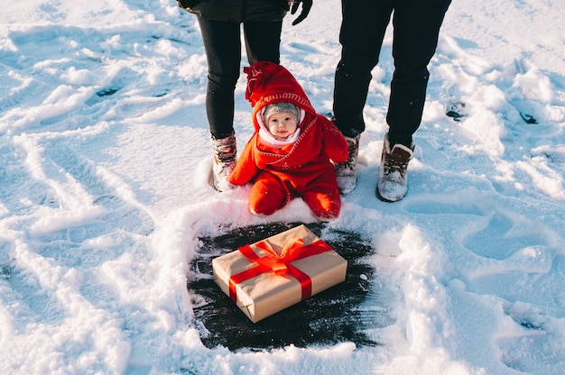 Winter family sled baby