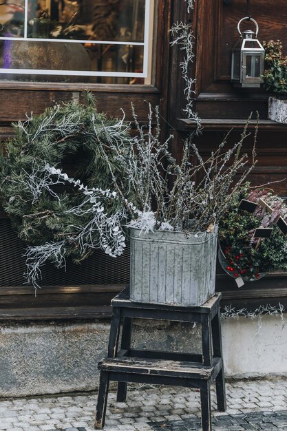 Winter flowers and wreath as christmas decoration at flower shop