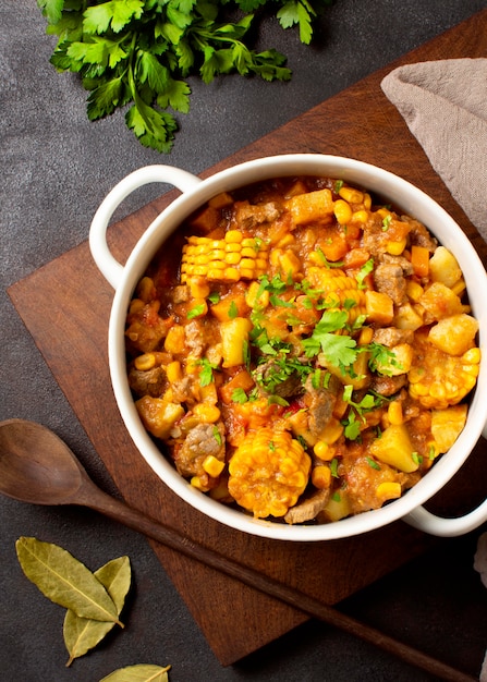 Photo winter food stew in bowl flat lay