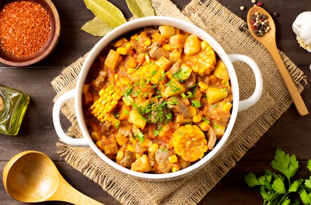 Winter food stew in bowl and spices