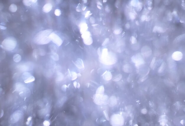 Winter glitter snow bokeh background