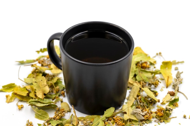 Winter herbal tea isolated on a white background linden tea
immuneboosting herbal tea medicinal tea prepared from linden leaves
clove particles and chamomile