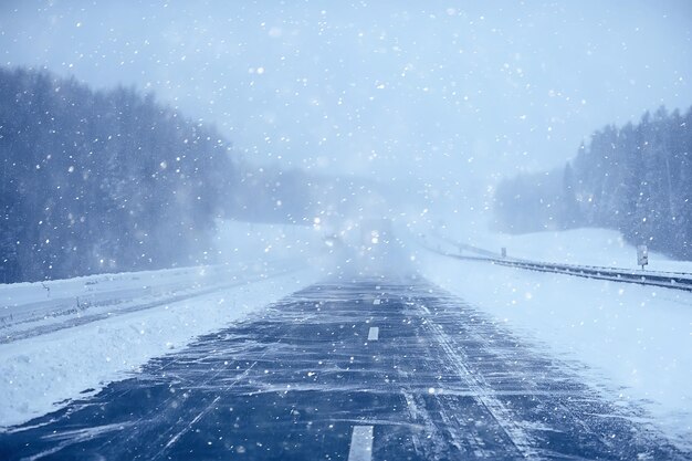 winter highway snowfall background fog poor visibility