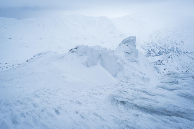 Winter landscape with hoarfrost on a rock