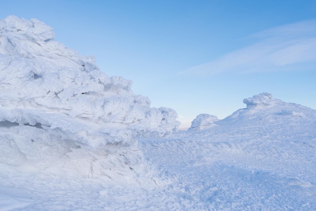 Winter landscape with hoarfrost on a rock