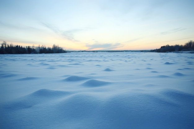 winter landscape with a horizon, field and sky