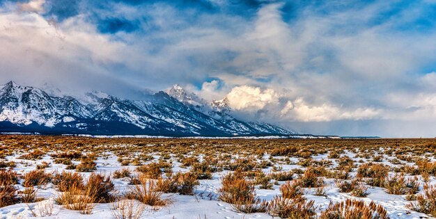 Winter landscape with mountains and clouds photo