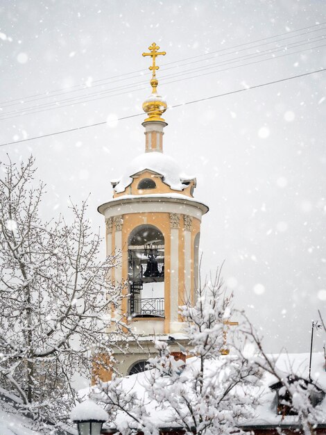 Winter landscape with a temple of Orthodox people Winter It's snowing