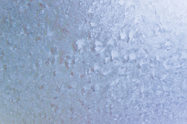 Winter natural background with frozen glass and beautiful unique texture