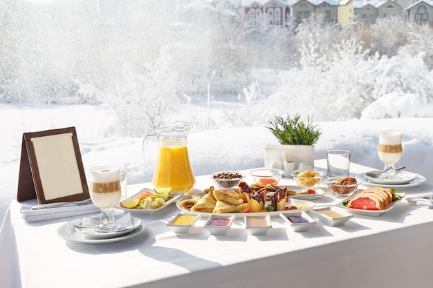 Winter pancakes breakfast on the terrace outside the restaurant