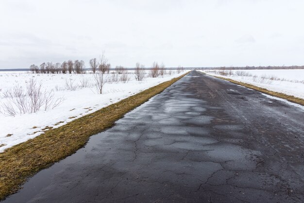 Winter road in a field