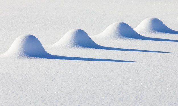 Foto la scena invernale, sfondo di neve con ombra