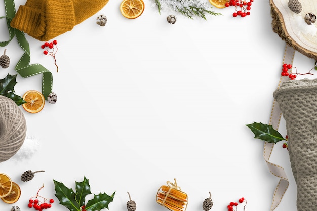 Winter Scene with Dried Fruit, Woollen Clothing, Holly, Berries and Pine Cone