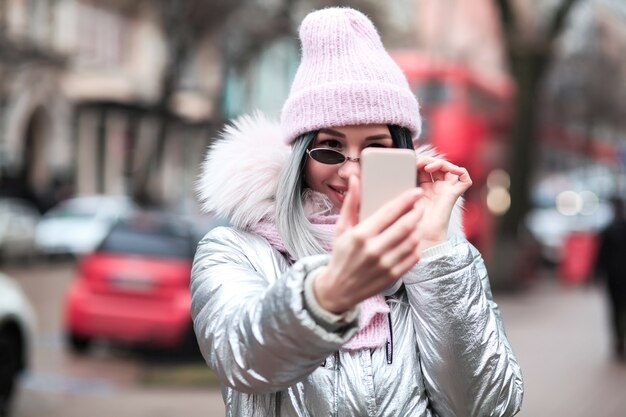 Winter selfie. Girl takes winter selfie.