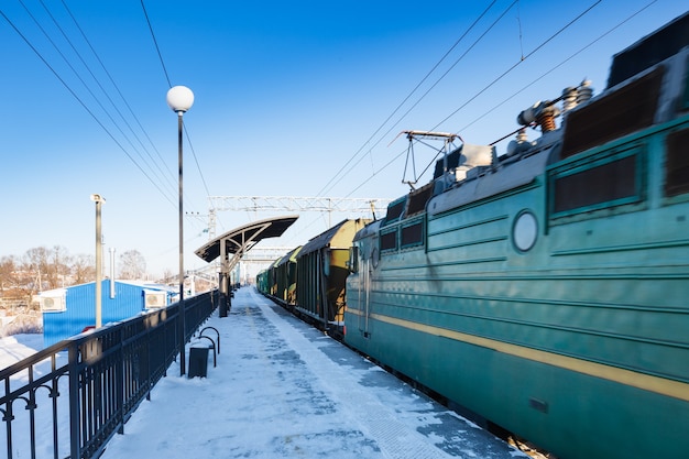 Winter view of  station  with driving up the train