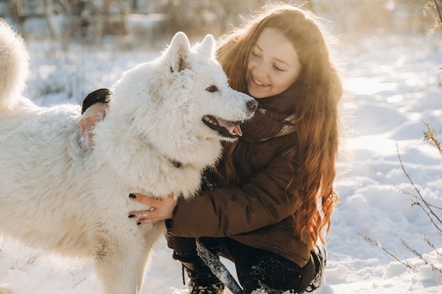 Winter walk with your favorite Samoyed pet