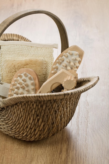 Wire basket on wooden background