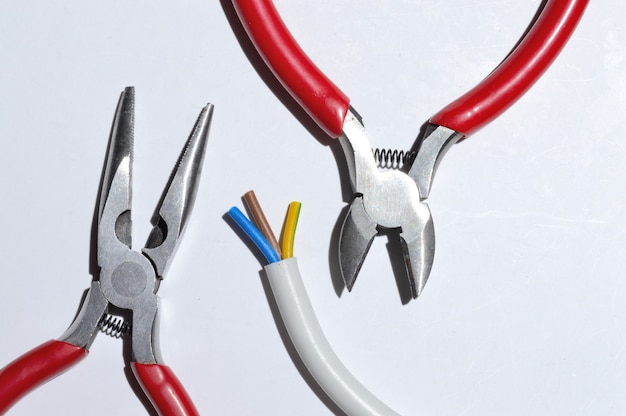 Wire cutters, wire, electrical tape