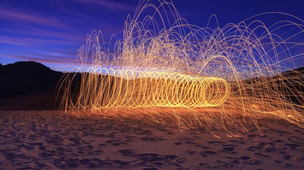 Photo wire wool on landscape against sky