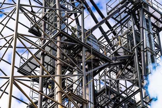 Wireframe in the plant Steel construction near grain elevators Selective focus from below