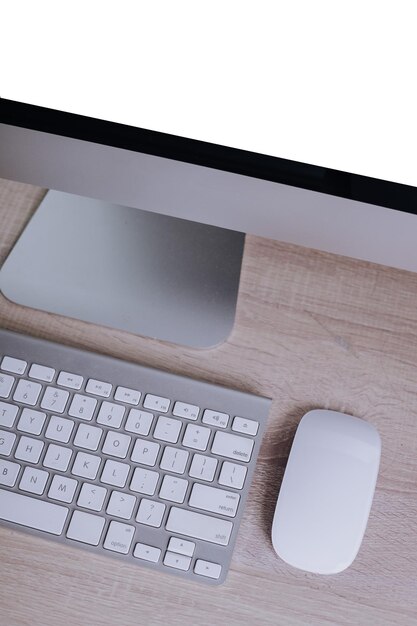 Wireless computer keyboard with the English alphabet and mouse are isolated on white background