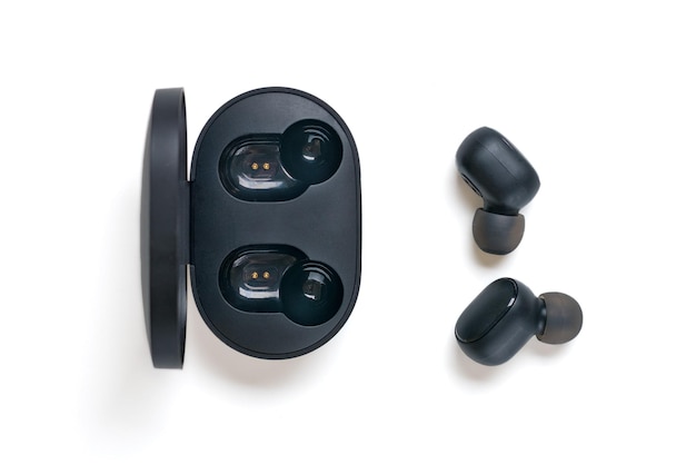 Photo wireless earbuds and capsule on white background