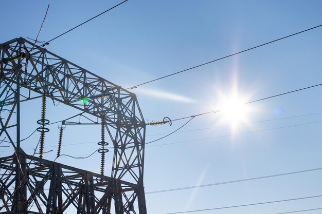 Wires against the background of the sun