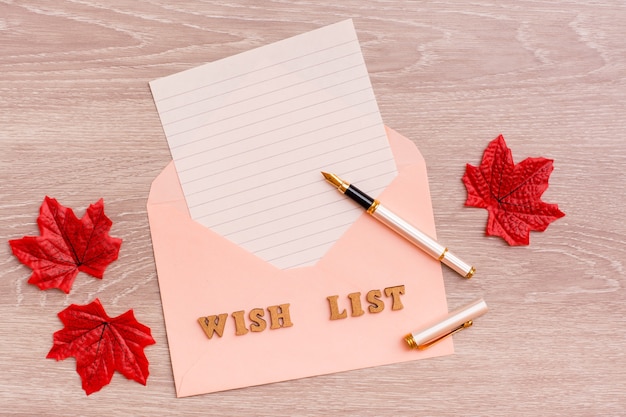 Wish list with blank paper for writing in an envelope