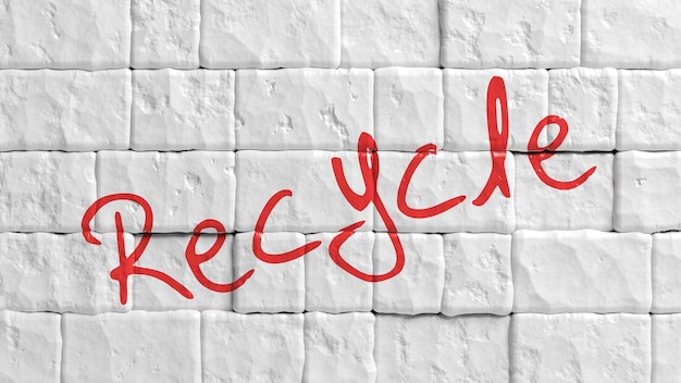 Wit geschilderde bakstenen muur met rode Recycle tekst graffiti