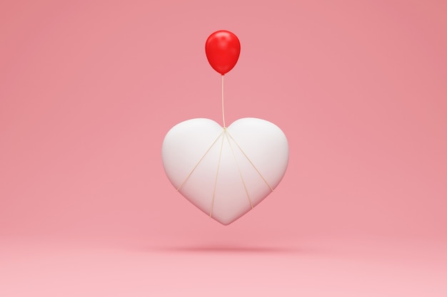 Wit hartsymbool met rode ballon op roze