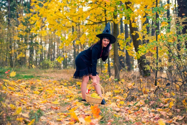 Witch in the autumn forest halloween cosplay halloween fall holiday celebration