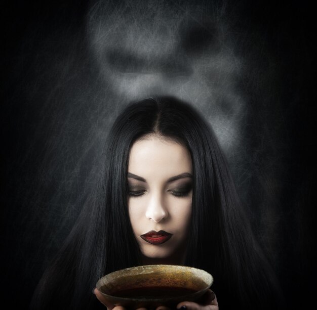 Witch with a cup of potion