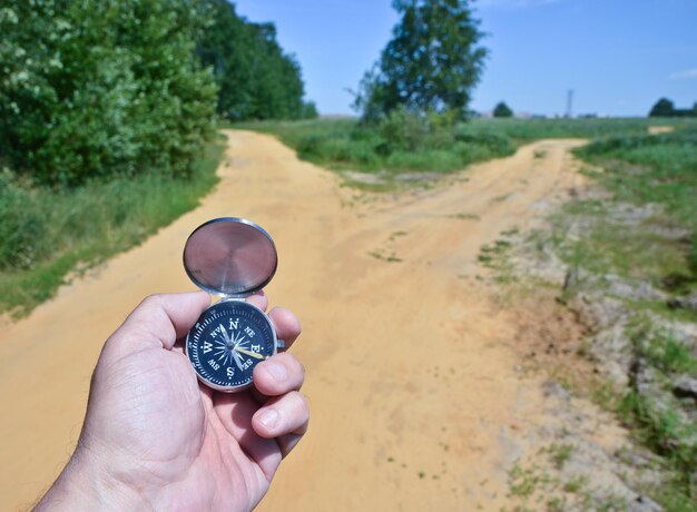 With compass on the walk