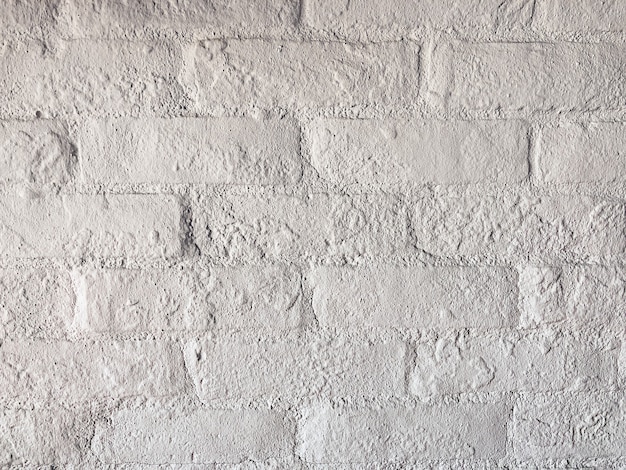 Withered white brick wall texture for background