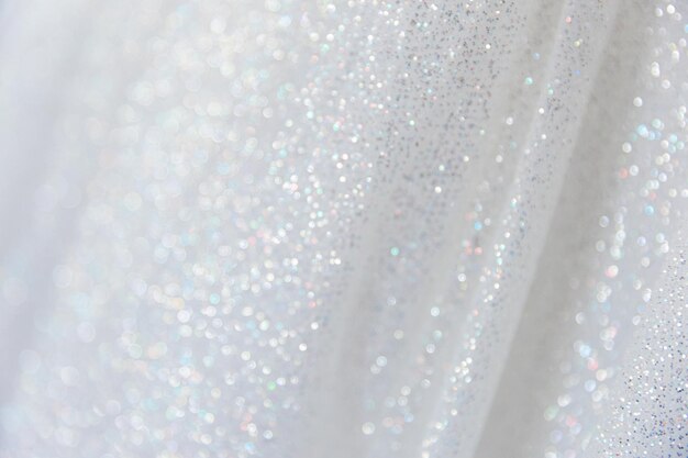 Foto witte achtergrond met gekleurde glitter