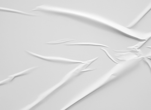Witte blanco verfrommeld en gevouwen papier poster textuur achtergrond