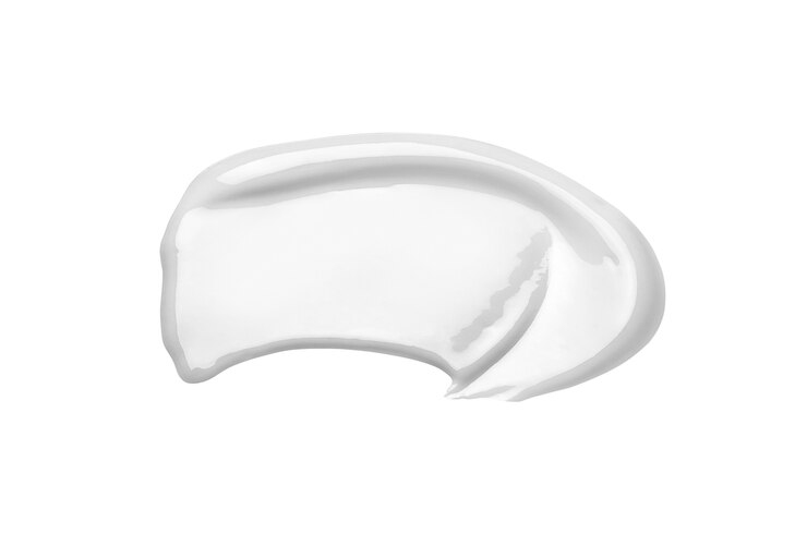 Foto witte cosmetische crème uitstrijkje geïsoleerd op wit