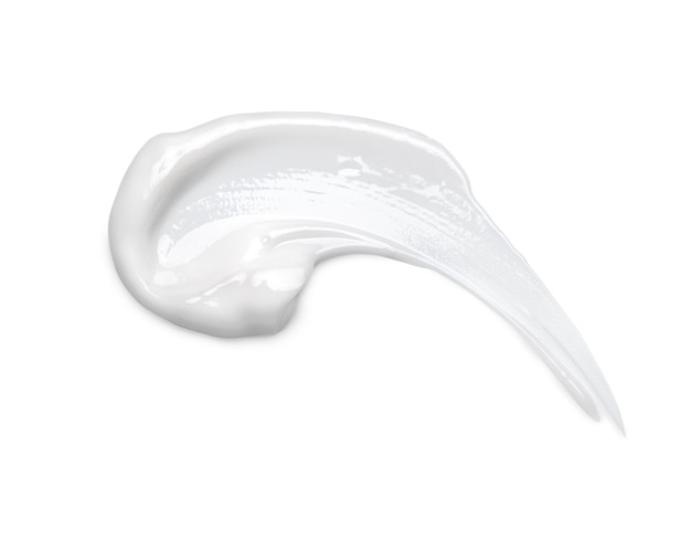 Witte cosmetische crème uitstrijkje geïsoleerd op wit