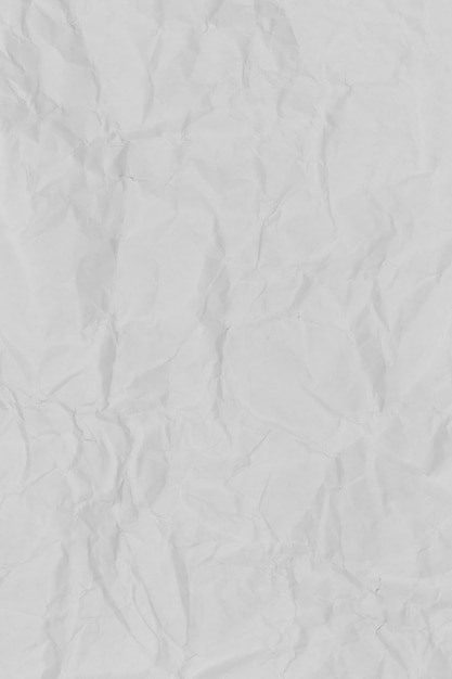 Witte gevouwen papieren achtergrond met ruwe textuur