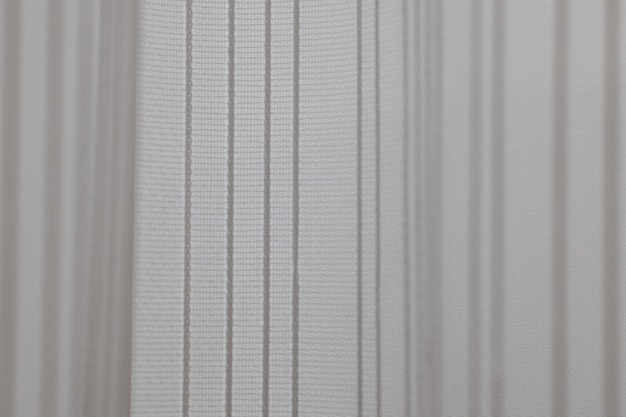 Witte gordijntextuur close-up