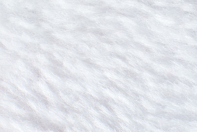 Witte katoenen handdoek of tapijt pluizige textuur achtergrond. Close-up foto.