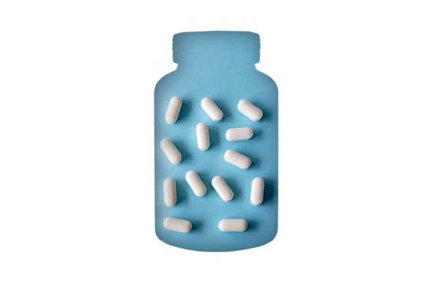 Witte medicijnen of capsules in een doorzichtige 2D-fles Magnesium Vitaminen op blauwe achtergrond Geen plastic Vorm van een pot met supplementen op een witte achtergrond