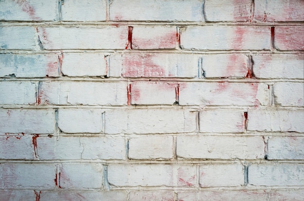 Witte oude bakstenen geschilderde muur voor textuur of achtergrond