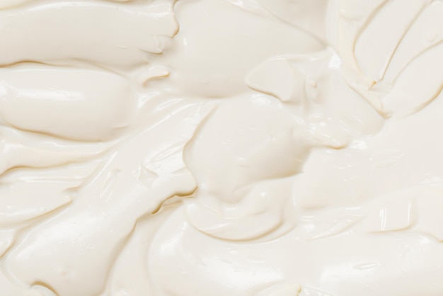 Witte slagroomtextuur. Bovenaanzicht.