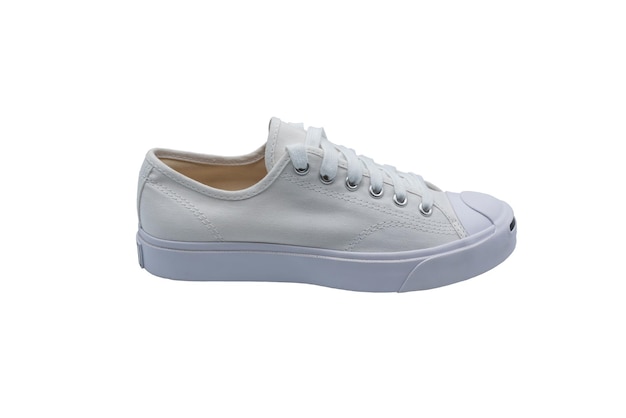 Witte sneakers op witte achtergrond met uitknippad