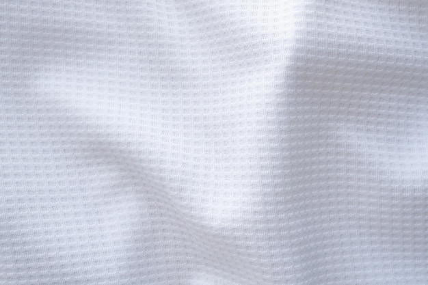 Witte sportkleding stof voetbalshirt jersey textuur abstracte achtergrond