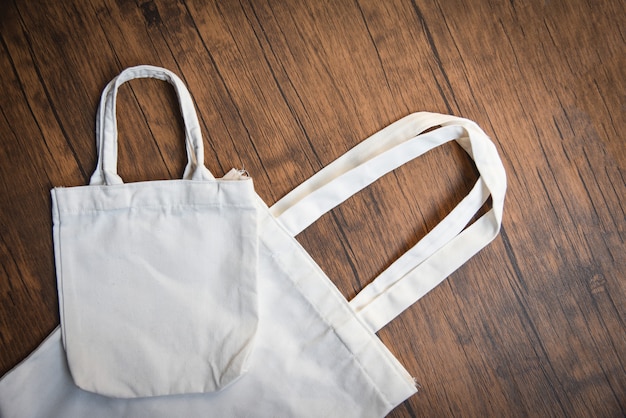 Witte tote doek eco tas doek winkelen zak op houten