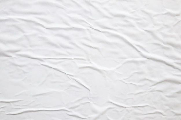 Witte verfrommeld en gevouwen papier poster textuur achtergrond