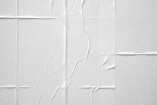 Witte verfrommeld en gevouwen papier poster textuur achtergrond