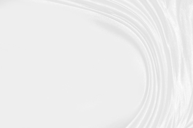 witte zijde getextureerde doek achtergrondClose-up van gegolfde satijnen stof met zachte golven